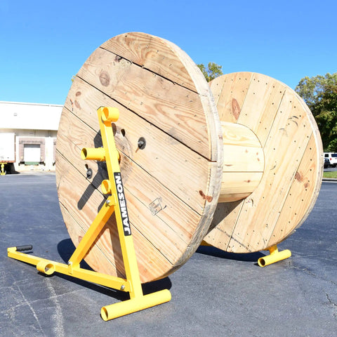 Beefed-Up Heavy Duty Portable Reel Buck With Adjustable Steel Cable Reel Stand, 1000 Lb Capacity, holding large wooden reel