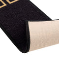 Close-up of Stair Treads With Greek Key Design No Slip Backing And Stain Resistant Finish Black 8.5 By 26 Inches Durable Indoor Stair Mat.