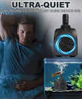 Quiet 25W Submersible Water Pump With 10 Foot Power Cord And 400GPH Flow, Tubing Included, shown near sleeping person and fish tank