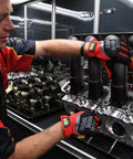 Mechanic using FastFit Work Gloves With Precision Fit For Dexterity And A Grip On Point Anti Slip And Abrasion Resistant Heavy Duty Touchscreen Compatible Vibration Damping Multipurpose Use Size Large Color Red