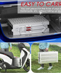 Slick Folding Scaffolding Deck With Quick Adjustable Height Settings For Drywall And RV Projects stored in car trunk, showcasing compact design.