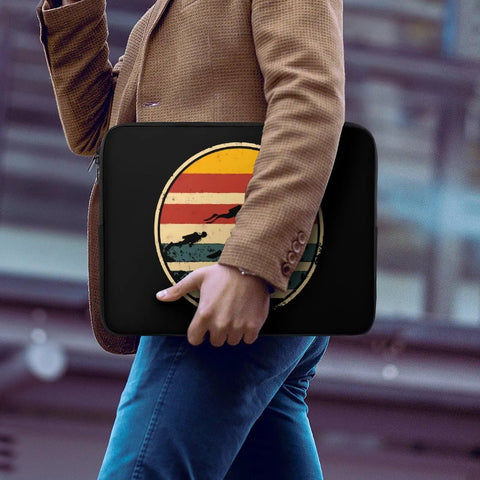 Scuba Dive Inspired Laptop Sleeve For 15 Inch Waterproof Durable Protective Case Carrying Bag Scratch Resistant Notebook Protector With Top Zipper Designed For Travel And Everyday Use, held by person in casual outfit