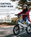 Adult riding XP Lite2 Folding Electric Bike For Adults, Arctic White, on a trail with LCD display and 48V battery visible