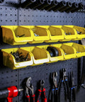36 Pack Pegboard Bin Kit With 18 Medium And 18 Large Yellow Bins for garage workshop organization installed on a pegboard.