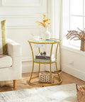 Round End Table With Charging Station And Glass Top beside sofa, featuring 2-tier gold accents and integrated power outlets.