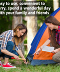 Two women securing a tent with Heavy Duty Aluminum Tent Stakes 20 Pack 7 Inch Ground Stakes With Hooks For Camping Tents Canopies Gardens.
