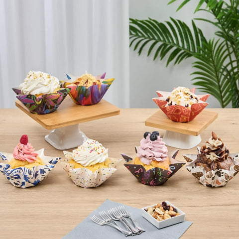 Colorful cupcakes in Bulk 4000 Pack Greaseproof Cupcake Liners 10.2 Ounce Disposable Oven and Freezer Safe Paper Muffin Cups.