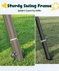 Close-up of heavy duty metal frame poles of 7.5 Ft Tall Backyard Swing Set with Spider Swing and Belt Swing on grass, green and brown