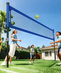 Backyard Volleyball Net Set With Pro Grade Sturdy Winch No Sagging Tension For A Tight Competitive Play Portable Outdoor Poles Adjustable Height Includes Volleyball And Carry Bag For Beach Or Grass set up in backyard with family playing