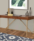 Game Changing Adjustable Standing Desk With Dang Sturdy Gold Metal Legs And Smooth Walnut Top Featuring No Sweat Height Adjustments For Cozy Bedrooms Or Epic Gaming Setups, shown with decorative items.