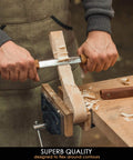 Straight Draw Knife For Wood Carving Featuring Hella Comfy Solid Oak Handles Coated In Natural Linseed Oil in use, trimming wood.