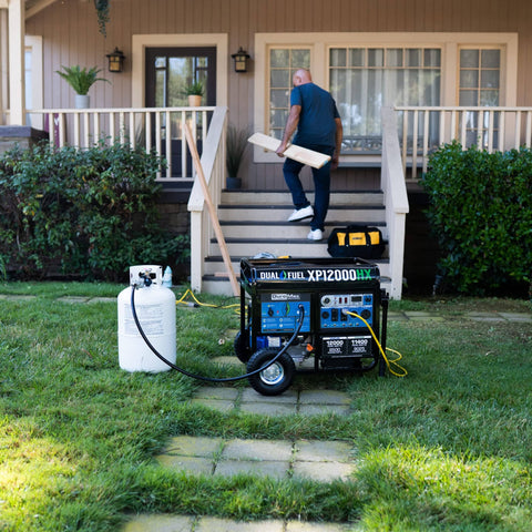 Keep The Lights On With A 12000 Watt Dual Fuel Portable Generator For Whole Home Power Backup Gas Or Propane in front of house