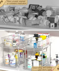 Clear Two Tier Under Sink Sliding Organizer With Adjustable Dividers Heavy Duty Waterproof Cabinet Rack For Bathroom Pantry showing organized medication bottles.