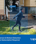 2K Indoor Outdoor Wired Security Camera Kit captures person running with motion detection in yard, highlighting surveillance features.