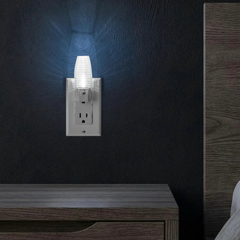 Plug In LED Night Light With Dusk To Dawn Sensor, 5000K Daylight, 5 Lumen Output on bedroom wall near nightstand