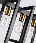 Close-up of Six Light Kitchen Island Pendant Chandelier in Industrial Style Matte Black with Antique Brass Finish showing bulbs.