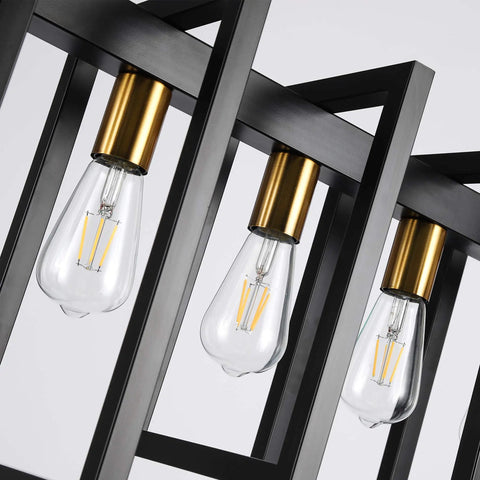 Close-up of Six Light Kitchen Island Pendant Chandelier in Industrial Style Matte Black with Antique Brass Finish showing bulbs.