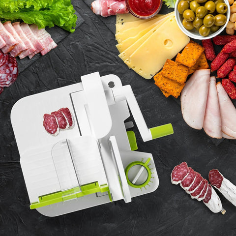 Top Notch Manual Rotary Deli Slicer With A Six Point Five Inch Serrated Blade And Dead Simple Thickness Tweaks Plus Bonus Two In One Peeler For Hassle Free Carving Of Meats Cheeses Bread And Big Loaves