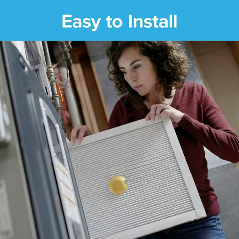 Person installing 16x20x1 Smart Air Filter MPR 2200 MERV 13 Two Pack With Bluetooth Life Tracking For Allergens in furnace