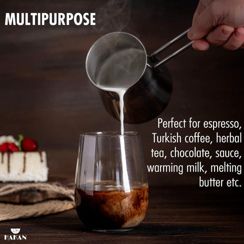 Pouring milk from Go-To Turkish Coffee Pot Cezve Ibrik Briki Stainless Steel Stove Top Pot into a glass, with cake in the background.