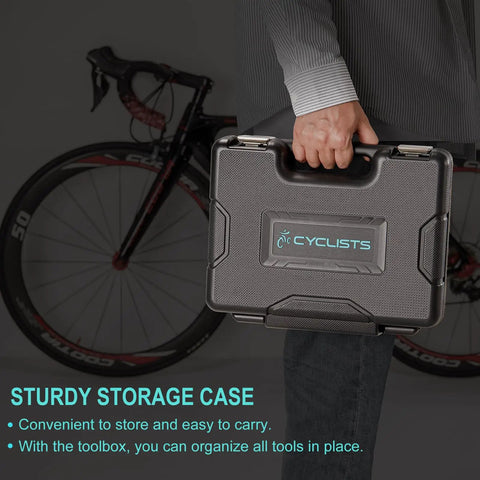 Person holding a closed portable black case labeled 'Cyclists' beside a bicycle, part of All-In-One Bike Tool Kit With Storage Case.