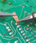 Solder Wick With Copper Wire For Excellent Absorption used on PCB, showing flux enhanced copper braid for clean joints and fast absorption.