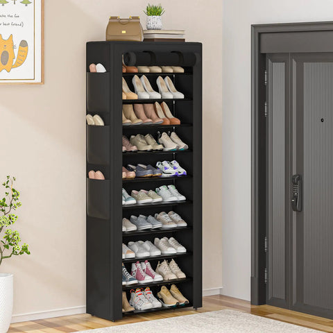 Tall Black 10 Tier Shoe Rack With Six Large Side Pockets 23.6 Inch Wide 11.4 Inch Deep 68.9 Inch Tall Holds 36 To 41 Pairs Of Shoes Ideal Entryway Or Closet Organizer in a room next to an entry door, displaying various footwear on shelves.