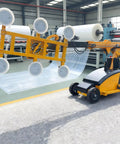 Durable Rock Solid Heavy Duty Glass Vacuum Lifter Robot gripping oversized glass sheet in a factory setting.