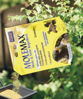 Mole And Vole Repellent Granules For Lawn And Garden 10 Pound Ready To Use Outdoor Pest Control packaging with greenery background