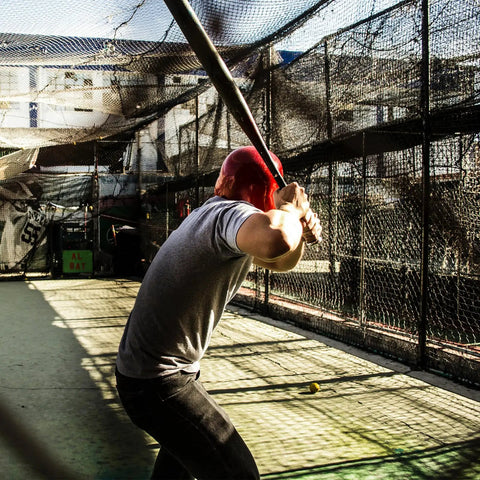 Baseball And Softball Batting Cage Net With Realistic Catcher, Backyard Practice Net, man batting in heavy duty sports net