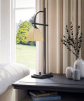 Oil Rubbed Bronze Arch Table Lamp For Home Office Urban Industrial Desk Light With Glass Shade 28 Inch Tall 11 Inch Reach On Off Base Switch Uses One 100W Bulb Perfect Reading Light And Modern Accent Piece on a desk with decor