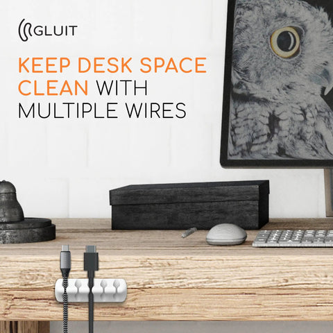 Five Pack Cable Organizers For Desk And Nightstand With Adhesive Clips Fifteen Slots White Cord Management System on a desk