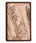 Leather card holder featuring a laser-engraved "We the People" design on the front