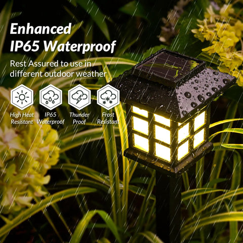 Enhanced IP65 waterproof solar path light in garden displaying durability in rain, part of 12 Pack Solar Path Lights Outdoor Walkway Garden Landscape Driveway Waterproof Warm White Solar Powered Lights Auto On At Night No Fuss Easy Yard Glow Every Night.