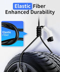 Heavy Duty Nacs Ev Charging Extension Cable Flex Your Tesla Charge Game With 21 Ft Extra Reach 240V 50A Rating attached to a tire.