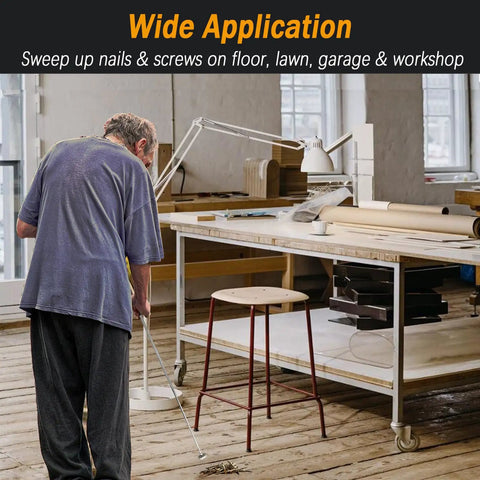 Man using Telescoping Magnetic Pickup Tool 40 Inch Extendable Magnet Stick With 35 Lb Pull to collect metal in workshop