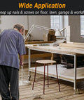 Man using 40 Inch Telescoping Magnetic Pickup Tool With 35 Lb Pull Extendable Heavy Duty Magnet Stick for metal debris in a workshop