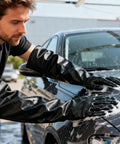 Heavy Duty Chemical Resistant Rubber Gloves With Killer Anti Slip Grip Long Cuff Workhorse Grade Industrial Safety Gear Built Tough As Nails For Daily Grinds And Hazardous Messes On The Worksite used for washing a car.