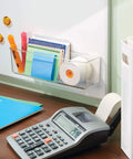 Clear Plastic Wall Mount Organizer Shelf For Kitchen Bathroom Office Bedroom Garage And Craft Room 3 By 11 By 3.25 Inches holding stationery on wall.