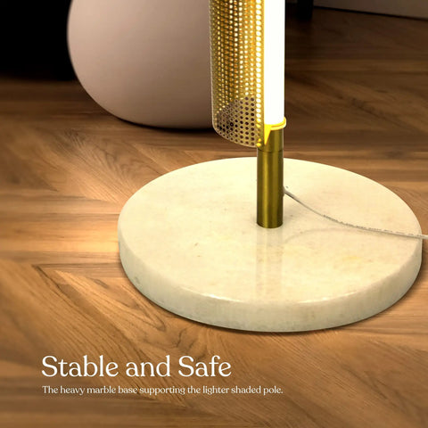 Close-up of the marble base of Callie LED Floor Lamp 55 Inch Tall Industrial Style With Metal Grid Shade for stability.