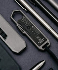 Top view of Titanium EDC Wrench for Everyday Carry with One Handed Operation Removable Pocket Clip Paracord Lanyard and Key Ring Universal 25 Size SAE and Metric Wrench Set in Silver.