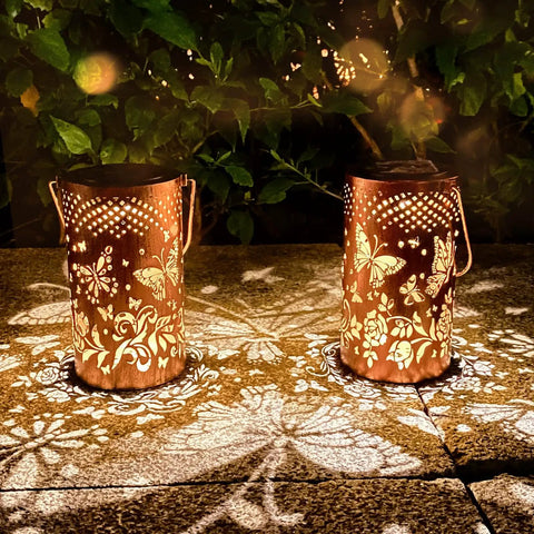 Outdoor Solar Lanterns Hanging Light With Butterfly Pattern Waterproof Led Garden Decor casting warm glow on patio