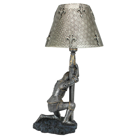 Weary Knight From Battle's End Sculptural Lamp For Home Or Garden with pierced metal shade and kneeling armor-clad warrior