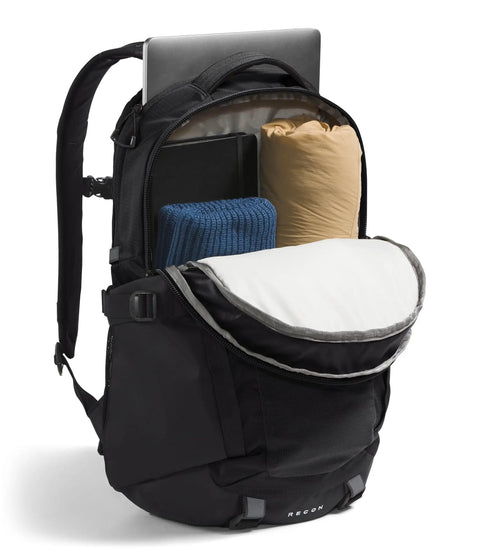 Recon Everyday Laptop Backpack For Work And School with open main compartment, showing laptop sleeve and packed items.