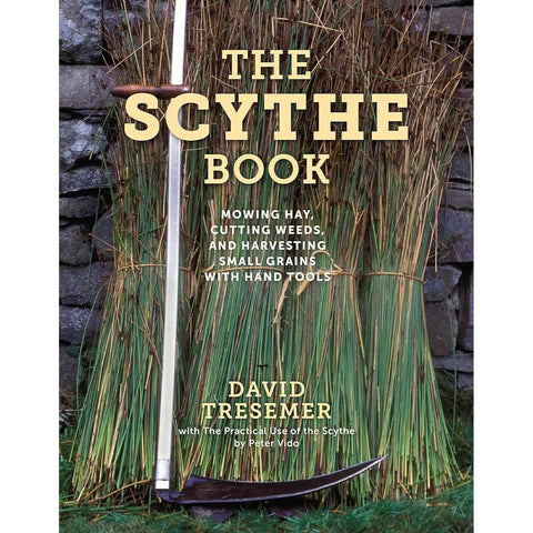 "The Scythe Book" cover with scythe leaning against a stack of reeds and a stone wall.