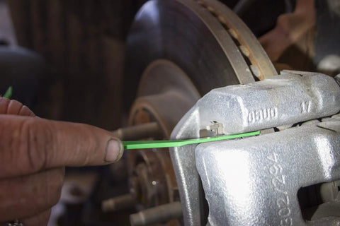 Using 9 Piece Manual Brake Pad Wear Gauge Set With Offset Tips For Accurate Lining Thickness Measurement Whether Straight On Or At 90 Degrees To The Rotor, No Guesswork And Easy Pad Checks Without Removing Wheel Or Caliper on a car brake pad