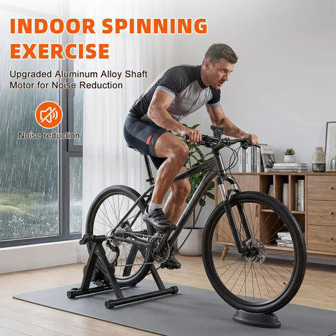 Man using Indoor Magnetic Bike Trainer Stand With Six Level Resistance Fits 26 To 28 Inch And 700C Wheels Includes Front Wheel Riser Block