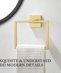 Brushed Gold Stainless Steel Towel Ring square design with white towel, wall mounted in modern bathroom setting.