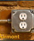 4 Inch Square Electrical Box With Ten Half Inch And Six TKO Knockouts, Welded Steel Construction For Heavy Duty Use installed on brick wall