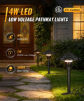 All In One LED Low Voltage Landscape Lighting Kit With Eight Pathway Lights And Transformer One Hundred Foot Wire And Connectors 3000K Waterproof Yard Garden Walkway Lighting For No Fuss Easy DIY Setup illuminating a cobblestone path at night.
